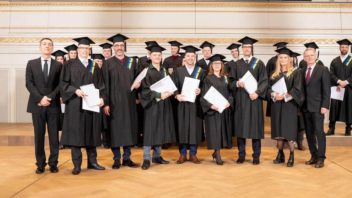 Foto Absolvent/innen mit Bestnoten EMBA-Studium 2020